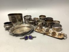 Small silver including nine napkin rings, hip flask cup, miniature tea set, dish etc.