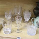 A collection of nine assorted antique etched and cut drinking glasses, tallest 22cm