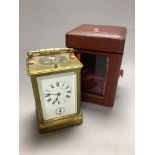 An early 20th century laquered brass repeating carriage clock with alarm, marked apprentice of