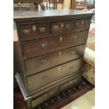 An 18th century oak chest on stand, width 100cm depth 50cm height 129cm