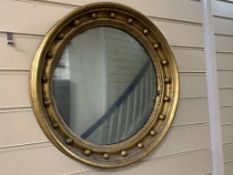 A Regency design gilt convex circular mirror, diameter 49cm