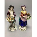 A pair of Continental porcelain figures, height 24cm