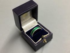 A Garrard's modern silver and green enamel band,size O.