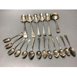 A collection of Georgian silver Old English pattern flatware,comprising five tablespoons, a sauce