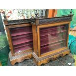 A near pair of glazed mahogany wall cabinets, larger width 66cm depth 21cm height 82cm