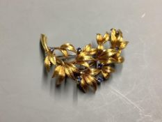 An 18ct yellow gold and small sapphire openwork foliate brooch,42mm,9.3g