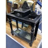 A late Victorian ebonised oak hallstand carved in Flemish style, length 77cm, depth 32cm, height