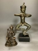 A Nepalese bronze figure of a deity, total height 33.5cm and a copper alloy figure of Green Tara