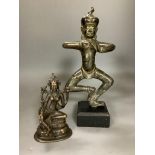 A Nepalese bronze figure of a deity, total height 33.5cm and a copper alloy figure of Green Tara