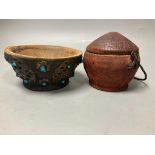 A Tibetan wooden bowl, diameter 13cm and a woven lidded basket