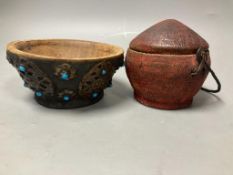 A Tibetan wooden bowl, diameter 13cm and a woven lidded basket