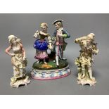 A Continental porcelain group of a couple picking flowers and a similar pair of figuresdepicting a