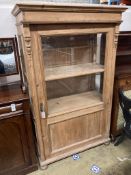 A 19th century East European pine vitrine, width 104cm, depth 52cm, height 170cm