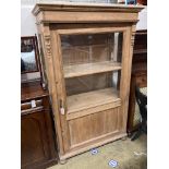 A 19th century East European pine vitrine, width 104cm, depth 52cm, height 170cm