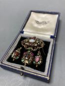 A Victorian yellow metal, enamel and multi gem set suite of jewellery (adapted), comprising a drop