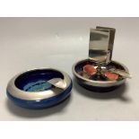Two Moorcroft ashtrays, Midnight Blue and Pomegranate patterns, tallest 12cm258