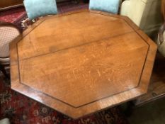 A Regency oak and ebony line inlaid octagonal topped breakfast table, width 138cm, height 72cmBy