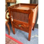 A Georgian mahogany tray-top commode, having tambour shutter on square supports, width 50cm depth