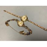 A lady's 1920's 18ct gold manual wind wrist watch, on a 15ct flexible strap, gross 21.3 grams,