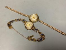 A lady's 1920's 18ct gold manual wind wrist watch, on a 15ct flexible strap, gross 21.3 grams,