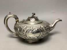 A Victorian embossed silver squat melon shaped teapot, Walter Morrise, London, 1846, height 14.1cm,