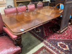 A Victorian mahogany extending dining tablewith moulded top rounded corners, on turned heavy reeded
