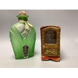 A papier mache and velvet ‘sedan chair’ scent bottle case, associated bottle and a Flore d’Argent