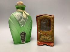 A papier mache and velvet ‘sedan chair’ scent bottle case, associated bottle and a Flore d’Argent