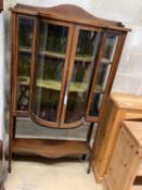 An Edwardian inlaid mahogany bow-fronted display cabinet, width 91cm, depth 40cm, height 166cm