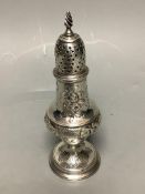 A George III silver baluster caster, with later embossed decoration, Thomas Shepherd, London, 1785,