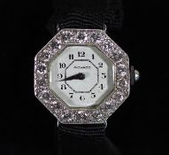 A 1930's/1940's platinum and diamond set Movado octagonal manual wind cocktail watch,the bezel set