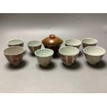 A 19th century Chinese painted soapstone rice bowl and cover and a group of red enamelled porcelain