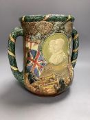 A Royal Doulton two handled loving cup of King George V and Queen Mary, height 26cm