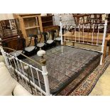 A Victorian style brass and painted iron porcelain mounted bed frame, width 150cm, length 210cm