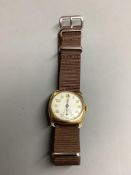 A gentleman's 1940's 9ct gold Longines manual wind wrist watch, with case back inscription, on