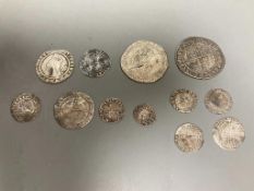A group of Elizabeth I silver coins - two shillings, 1584 and 1575 sixpences, 1561 and 1569