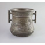 A Japanese archaistic bronze two-handled vessel, Meiji periodcast in high relief with men hanging