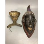 A tribal mask and a vessel