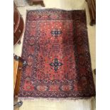 An African red ground rug, 142 x 103cm