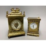 An early 20th century brass carriage timepiece and a champleve enamel timepiece, tallest 18cm