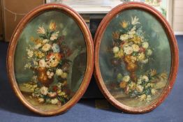 19th century Italian SchoolStill lifes of flowers in vases, an arch and water beyondpair of oils on