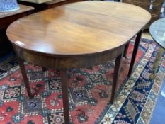 A George III mahogany D-end extending dining table, 157cm extended, width 106cm, height 71cm