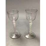 Two 18th century cotton twist cordial glasses, height 14.5cm