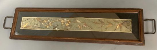 A Chinese gold couch work silk panel, mounted in a tray62cm