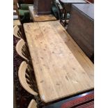 A Victorian style rectangular pine kitchen table, length 180cm, width 86cm, height 77cm and four