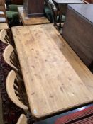 A Victorian style rectangular pine kitchen table, length 180cm, width 86cm, height 77cm and four