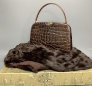 A Russell & Bromley brown crocodile effect handbag (made in France), a blond mink stole in Harrods