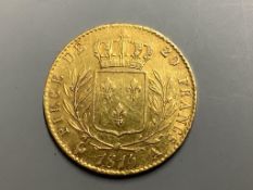 A French 20 Franc gold coin, 1814, Louis XVIII bare head to obverse, crowned wreath to reverse