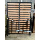 A Victorian style black metal bedframe, width 136cm