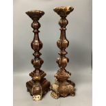 A pair of Italian Baroque style giltwood candlesticks55cm